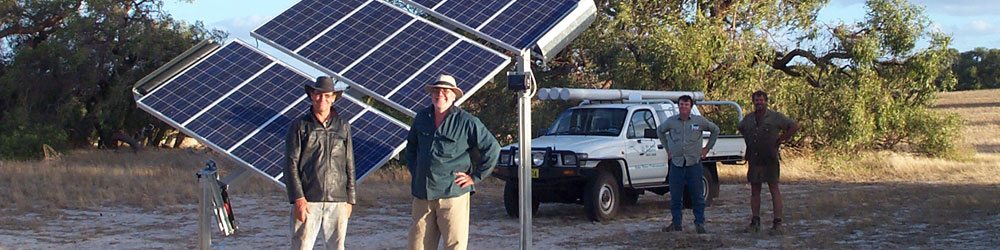 4 of WA Solar Supplies' team members shown standing near solar powered water pumps